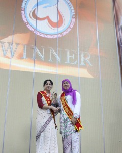 Receiving award as Filmmaker of Inspiration from the Minister for Social Affairs, Indonesia on the occasion of International Women's Day 2016