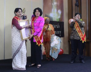 Receiving award from the Dirctor General, Radio Republik Indonesia